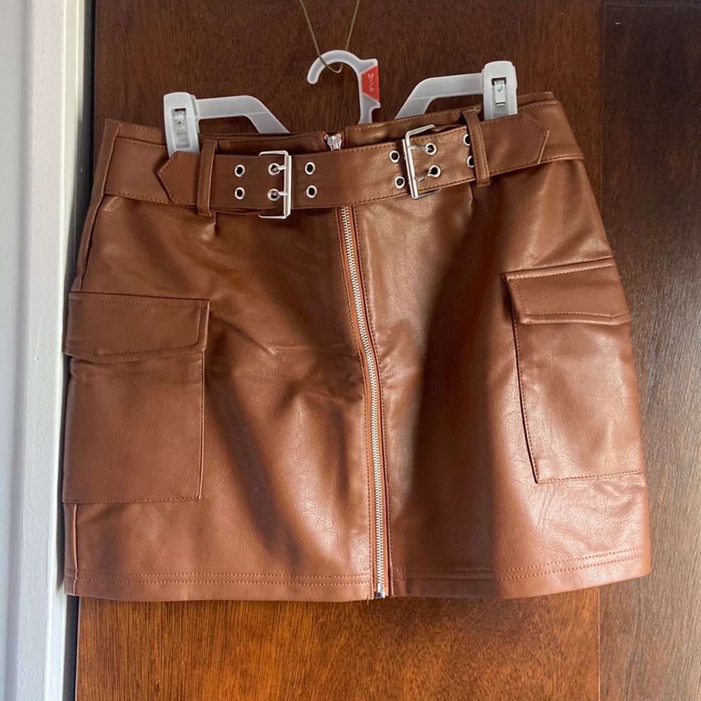 Leather mini skirt.